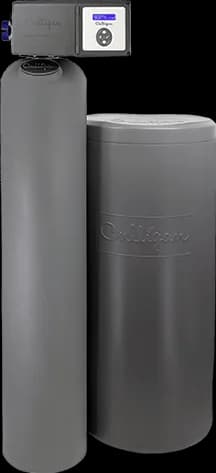 A water softener tank beside its brine tank